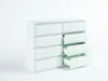 A white chest of drawers with some drawers open, set against a plain white background. Produktbild-Vorschau