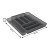 A gray cutlery organizer with multiple compartments is shown from a slightly elevated angle on a white background. Dimensions are indicated with lines and text. Anteprima dell’immagine prodotto