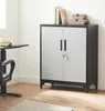 An office setting with a cabinet, desk, and chair. Produktbild-Vorschau