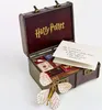 An open Harry Potter themed trunk filled with small items and a letter. Produktbild-Vorschau