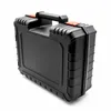 A black tool case with orange accents is shown against a white background. Produktbild-Vorschau
