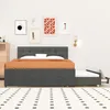 A bedroom scene with a bed and artwork on the wall. Náhled obrázku produktu