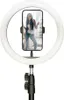 A ring light with a smartphone mounted inside, displaying a person taking a selfie. Produktbild-Vorschau