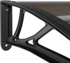 A close-up view of a black door awning bracket and the brown polycarbonate roof. Náhled obrázku produktu