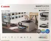 A product box for a Canon MAXIFY GX7050 printer, showing the printer in a home office setting. Produktbild-Vorschau