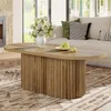 A living room scene with a coffee table in the foreground, a sofa and window in the background. Voir les images du produit