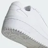 A close-up view of the sole and side of a white Adidas sneaker. Náhľad obrázku produktu