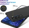 A black phone case is shown on top of a smartphone, highlighting its protective features. Voir les images du produit
