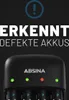 A black battery charger with indicator lights and batteries inserted. Produktbild-Vorschau
