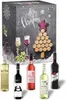 A Christmas-themed advent calendar box with wine bottles and glasses displayed in front of it. Podgląd zdjęcia produktu