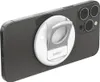 A Belkin iPhone holder with MagSafe is attached to the back of a dark gray iPhone. Produktbild-Vorschau