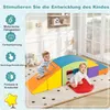 Two toddlers playing on a colorful foam climbing set in a room. Produktbild-Vorschau