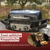 A portable gas grill is shown outdoors on a table, with a smaller inset image showing food being grilled. Produktbild-Vorschau
