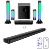A product shot of a soundbar system with multiple components and two smartphone screens displaying app interfaces. Produktbild-Vorschau