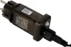 A close-up of a black power adapter with a European plug. Podgląd zdjęcia produktu