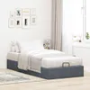 A bedroom scene with a bed and wall decorations. Produktbild-Vorschau