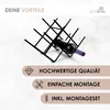 A black metal wine rack holding one bottle of wine, with marketing text and icons below. Produktbild-Vorschau