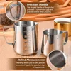 Two stainless steel pitchers with measurement markings on a wooden surface, with a close-up of a handle and a golden mug in the background. Anteprima dell’immagine prodotto