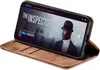 A smartphone in a brown flip case is displayed on a white background, showing a movie streaming interface on its screen. Produktbild-Vorschau