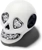 A white skull charm with clear crystal accents. Produktbild-Vorschau