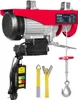 A red electric hoist with a silver motor and a black remote control, shown against a white background. Accessories like straps and a hook are also visible. Náhled obrázku produktu