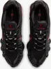 A top-down view of a pair of black and red Nike Shox TL sneakers. Produktbild-Vorschau