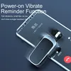A smartphone displaying an incoming call screen with a Bluetooth headset resting on it. Produktbild-Vorschau