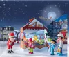 A festive Christmas market scene with Santa Claus, children, and a market stall, set against a snowy night sky with a full moon and Santa's sleigh. Produktbild-Vorschau