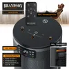 A Brandson heater with a remote control and a person relaxing in the background. Produktbild-Vorschau