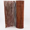 A rolled and unrolled willow screening mat against a white background. Produktbild-Vorschau