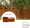 A rusty metal garden border with a butterfly design is shown in a garden setting. Produktbild-Vorschau
