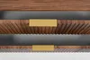 Close-up view of two wooden drawers with golden handles. Náhled obrázku produktu