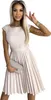 A woman wearing a beige dress and holding a clutch. Produktbild-Vorschau
