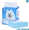 A package of pet training pads with a dog's image on it, and a stack of the pads next to it. Produktbild-Vorschau