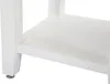 A close-up view of a white nightstand shelf and leg. Náhled obrázku produktu
