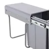 A close-up view of a gray built-in trash can system with two compartments, shown partially extended on a white background. Produktbild-Vorschau