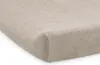 A close-up, angled view of a beige changing pad cover made of terry cloth. Voir les images du produit