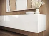 A close-up view of a white, high-gloss TV lowboard with a wooden background and a framed artwork above. Produktbild-Vorschau