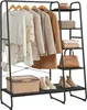 A clothing rack with clothes, shoes, bags, and storage boxes. Náhled obrázku produktu