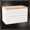 A white cabinet with a wooden top. Produktbild-Vorschau