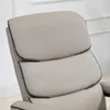 A close-up view of the headrest and upper backrest of a gray recliner chair. Produktbild-Vorschau