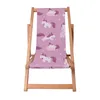 A wooden deck chair with a pink fabric featuring a unicorn and cloud pattern. Podgląd zdjęcia produktu