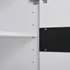 Close-up view of the interior of a cabinet, showing a white shelf and a black magnetic strip attached to the inner wall. Voir les images du produit