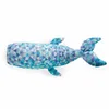A plush toy whale with a geometric pattern lies on a white background. Produktbild-Vorschau