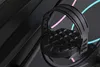 A close-up view of a black exercise bike pedal with a strap. Produktbild-Vorschau