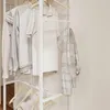 SoBuy Kleiderständer KLS21-W mit weißen Metallrahmen, Holzkleiderbügeln und Ablageboden im Wohnraum Produktbild-Vorschau
