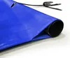 A close-up view of a rolled-up blue pool cover with a black roller and a strap with a buckle. Produktbild-Vorschau