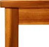 A close-up view of the corner of a wooden table or bench. Voir les images du produit