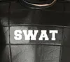 A close-up of a black tactical vest with the word "SWAT" printed in white. Anteprima dell’immagine prodotto