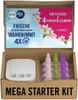 A cardboard box containing a Febreze starter kit for an air freshener, including the device and refill cartridges. Podgląd zdjęcia produktu